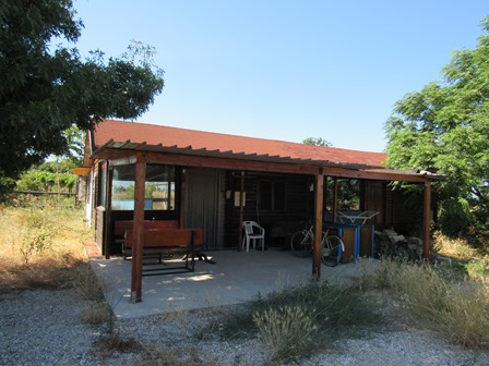 Detached, wooden house with 1 bed, 1500sqm of land 3km to the beach in an isolated location.1